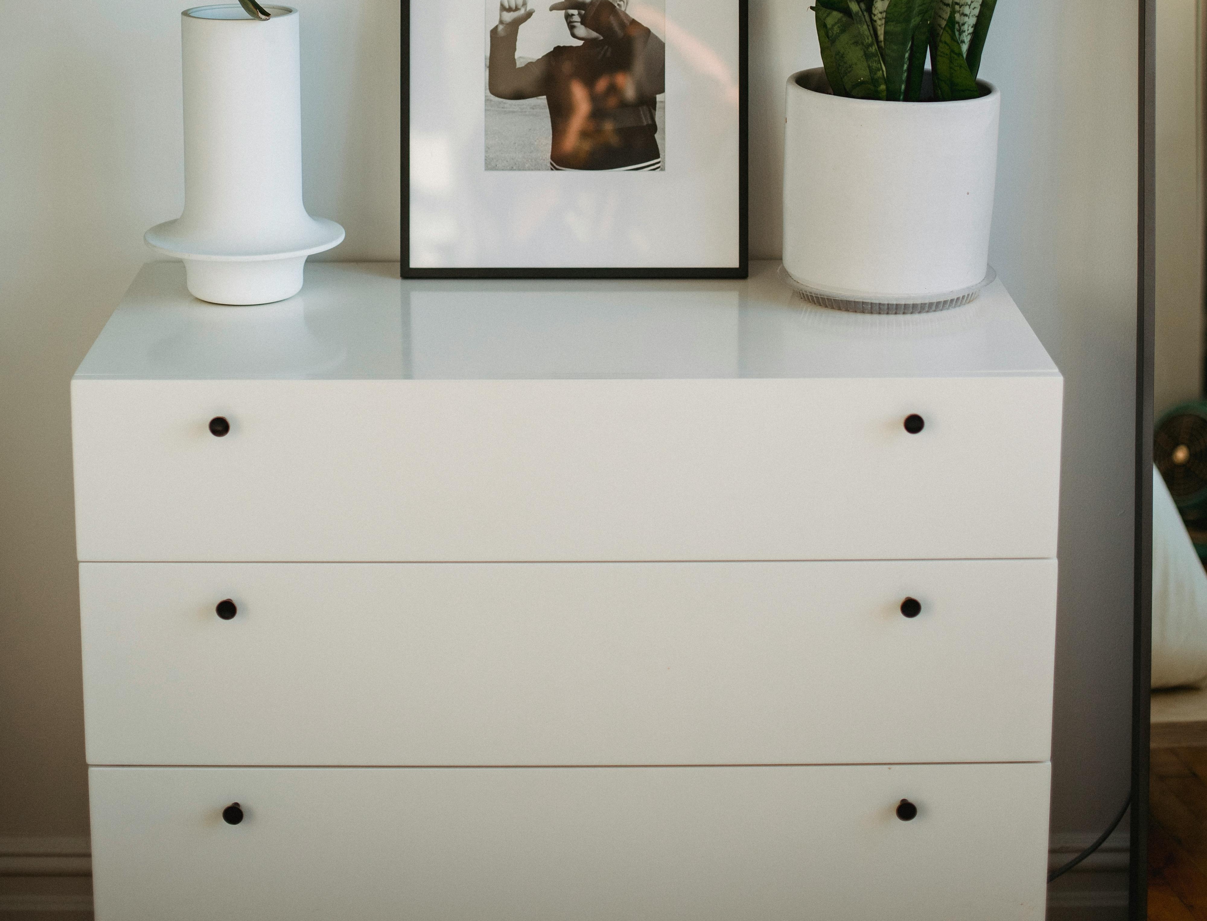 Assembled wooden dresser with multiple drawers