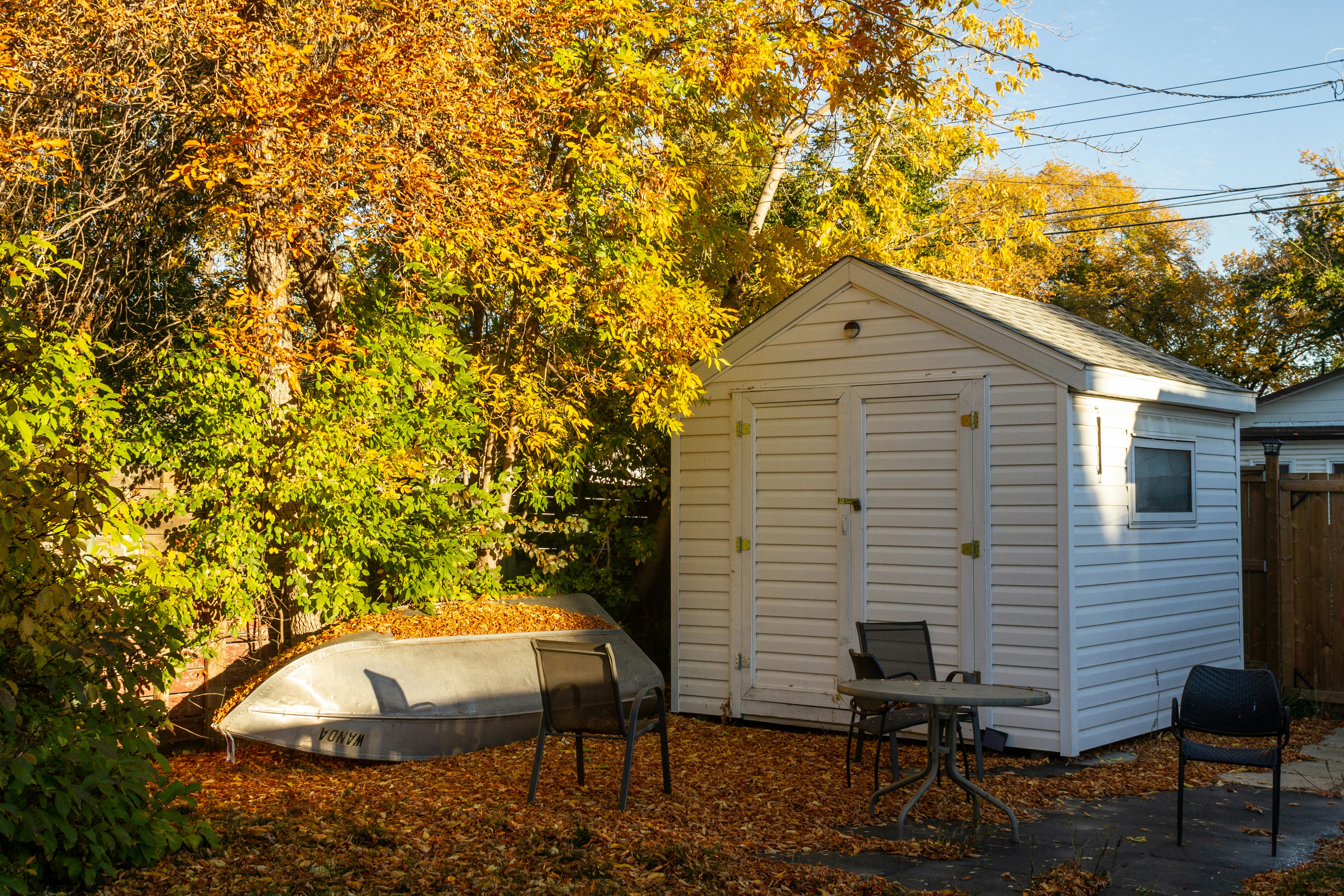A medium-sized garden shed for tool storage.